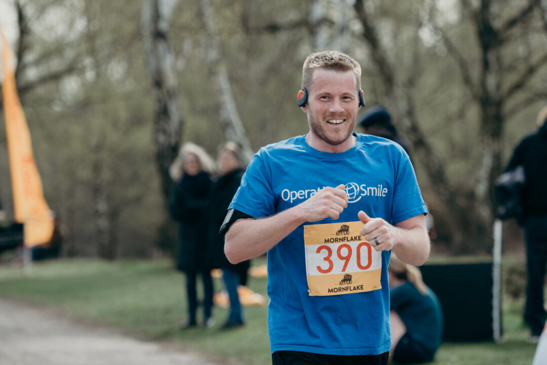 runner wearing operation smile tshit