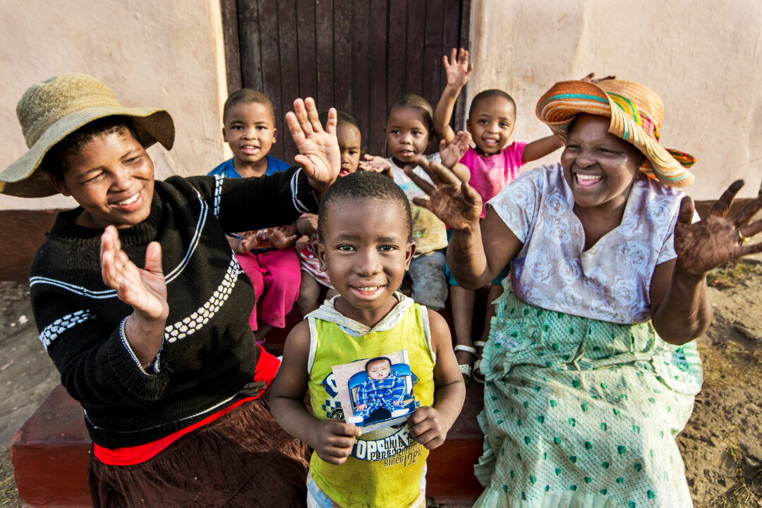 Six-year-old Thandile with his family, celebrating his new smile. Photo: Zute Lightfoot